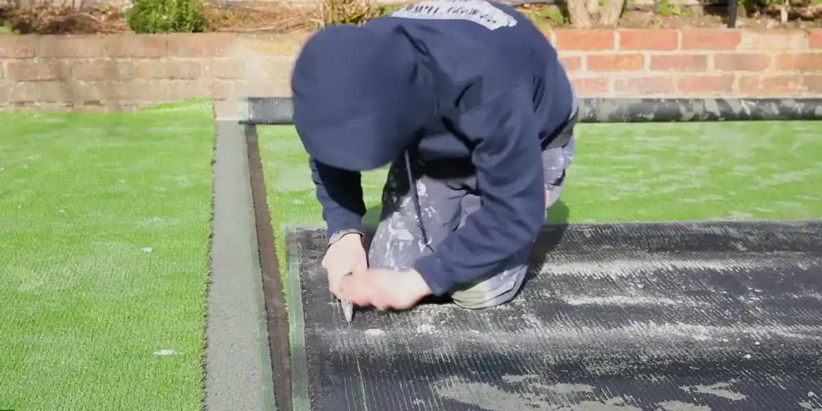 Trim Excess Edges While Installing Artificial Grass on Concrete